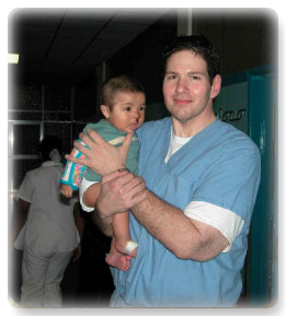 Dr. Lokeh and child in Guatemala